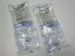Macchina per imballaggio di sacche per infusione